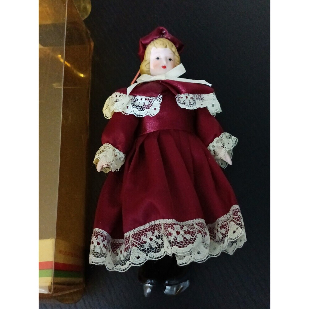 Kurt Adler Santa's World Ceramic Burgundy Dress Ice Skater Doll Ornament Open